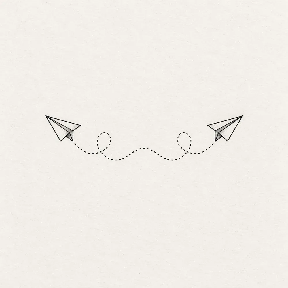 Two paper planes flying towards each other, joined by a looping dotted trail.