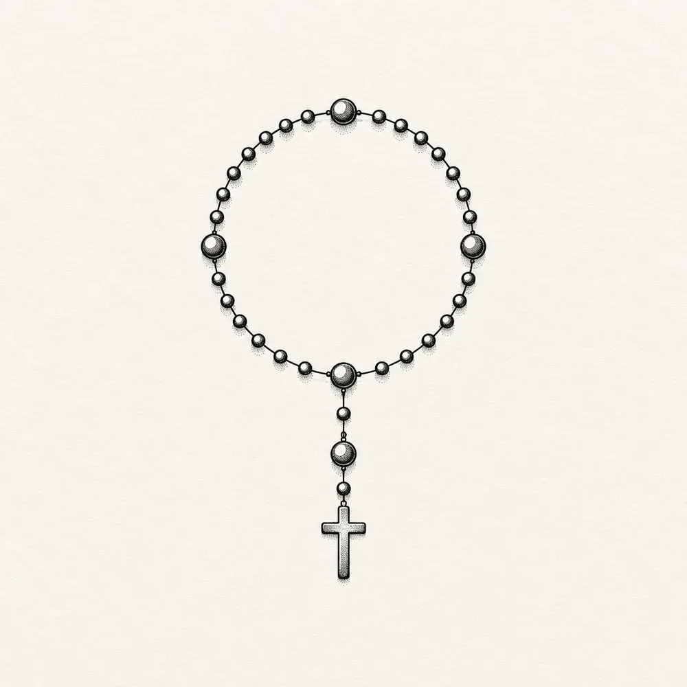 A rosary laid out as a circle of small beads with four larger beads marking the divisions, a short strand below ending in a plain cross.